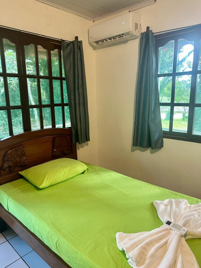 Comfortable rooms with air conditioning and ensuite bathroom at Chuchini Private Amazon Jungle Reserve & Eco Lodge
